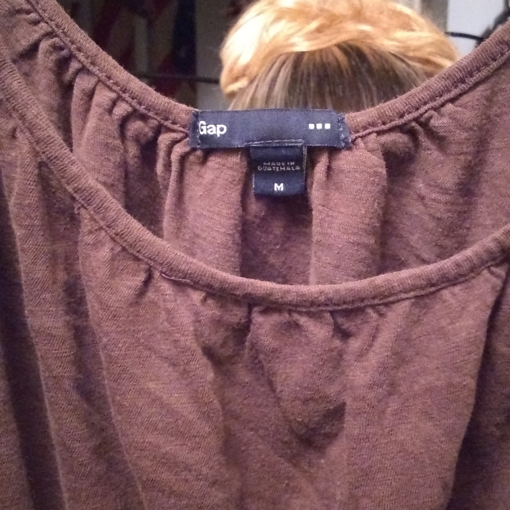 Brown gap halter string top.